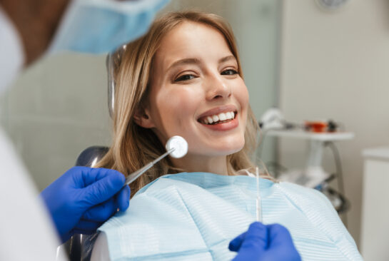 woman sitting in dental chair